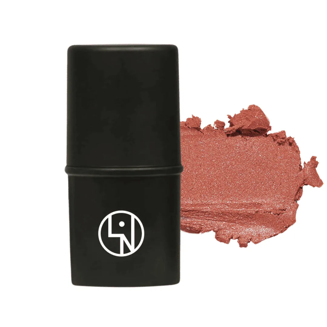 Lisa Noto Natural Radiance Stick with shimmery rose-gold swatch — multi-use balm for lips cheeks eyes