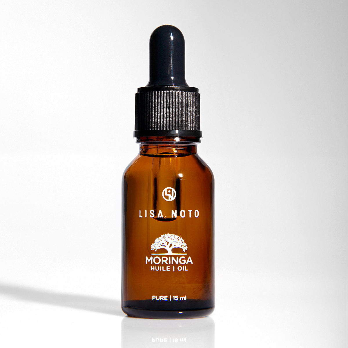 huile pure et biologique de moringa dans un contenant en verre écoresponsable