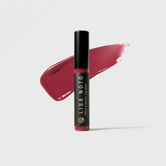 velvet Cherry lip gloss by Lisa Noto on a light neutral grey background, clean high-end e-commerce image with soft luminous light.